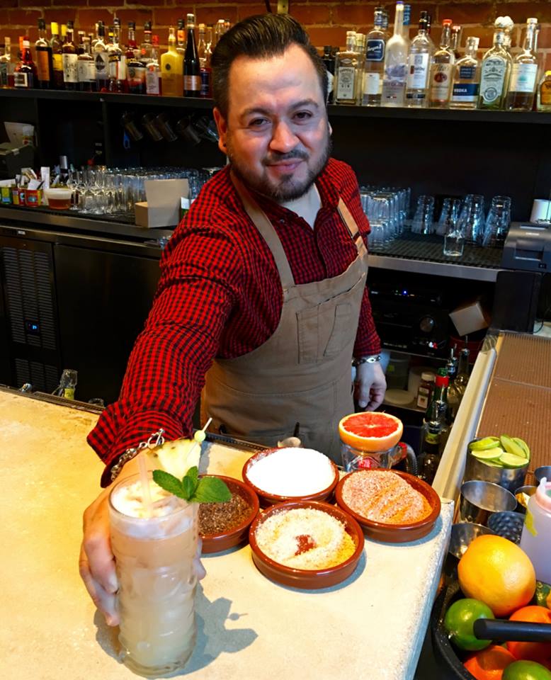 Manfred serving cocktails